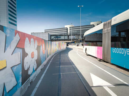 690 metres of street art take over Amsterdam’s Schiphol Airport