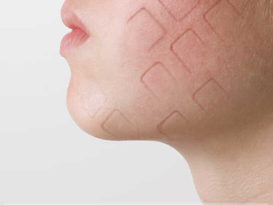 Keyboard marks, young woman's face